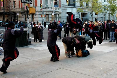 some guy flipping over 4 people