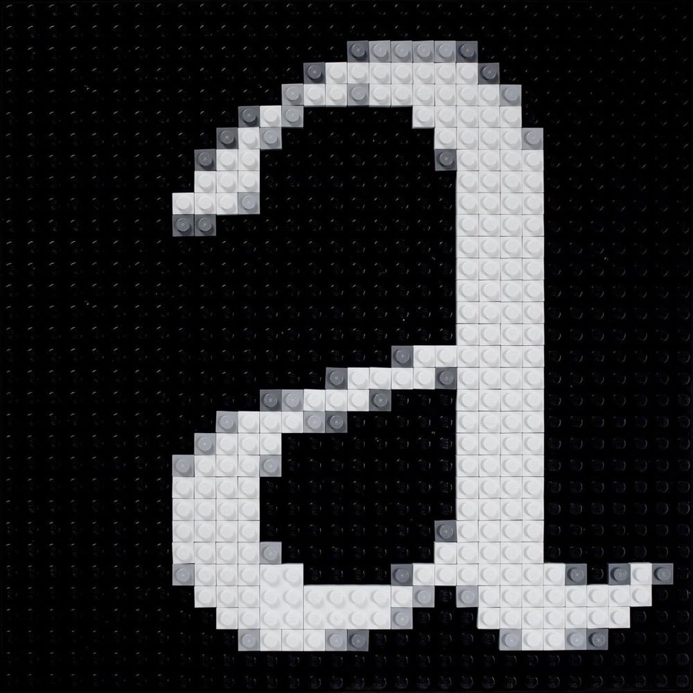 the letter 'a' made out of Lego bricks