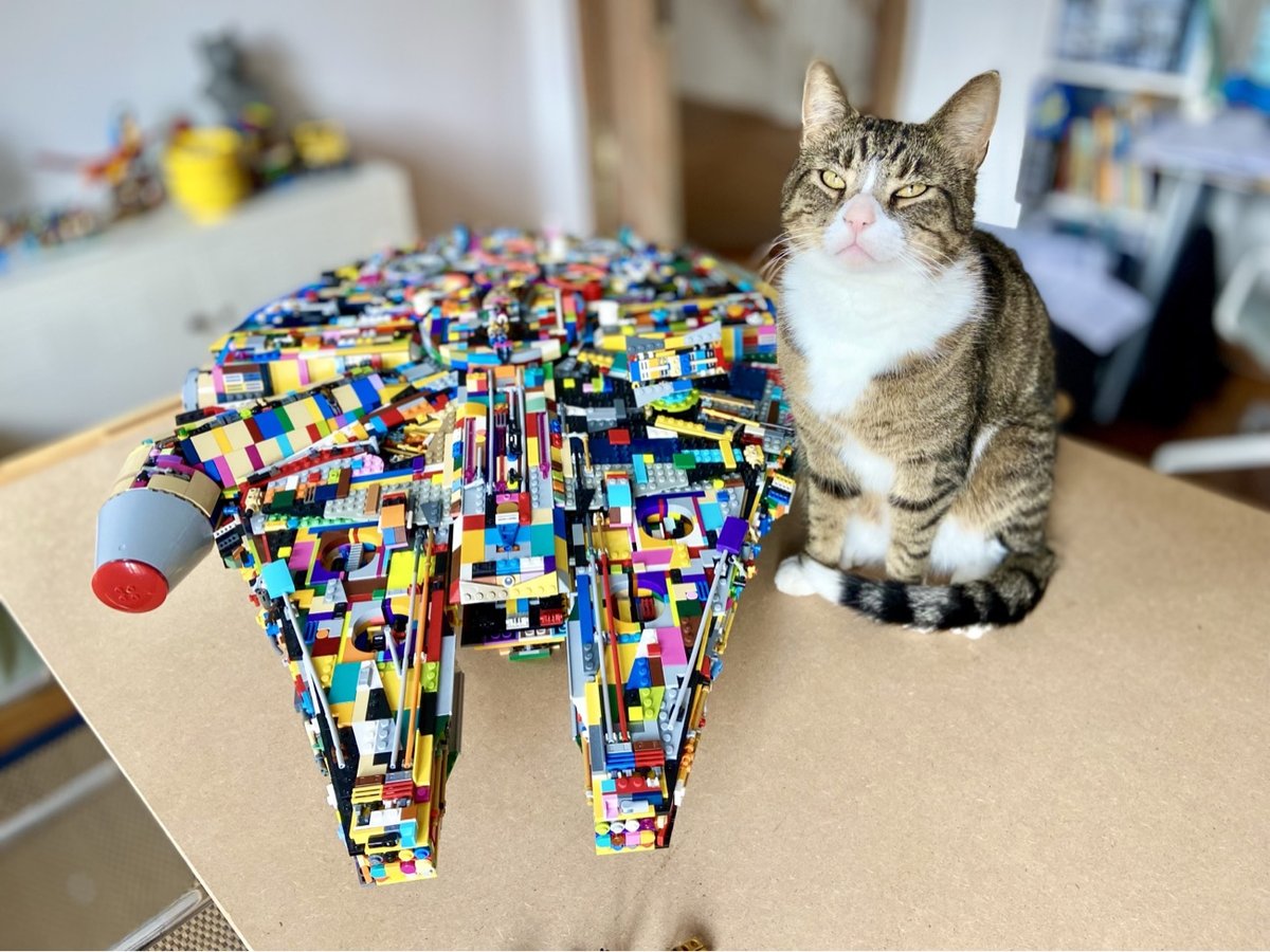 a Lego Millennium Falcon made out of all sorts of different color bricks