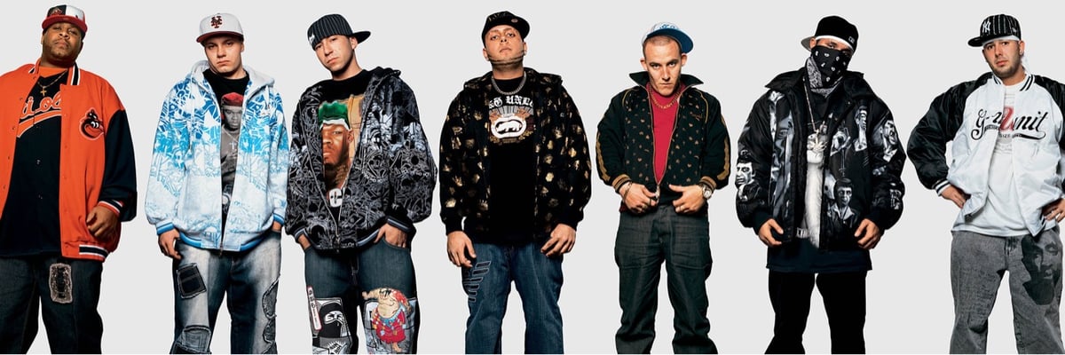 seven people who attended a 50 Cent concert, wearing baseball caps, baggy jeans, and big jackets