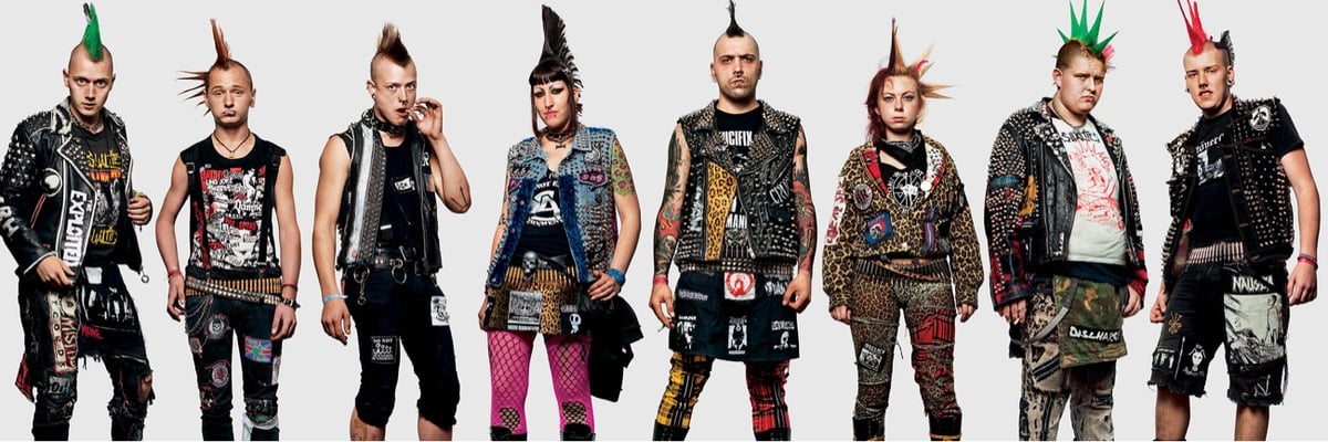 eight people who attended a The Casualties concert, wearing leather and mohawks