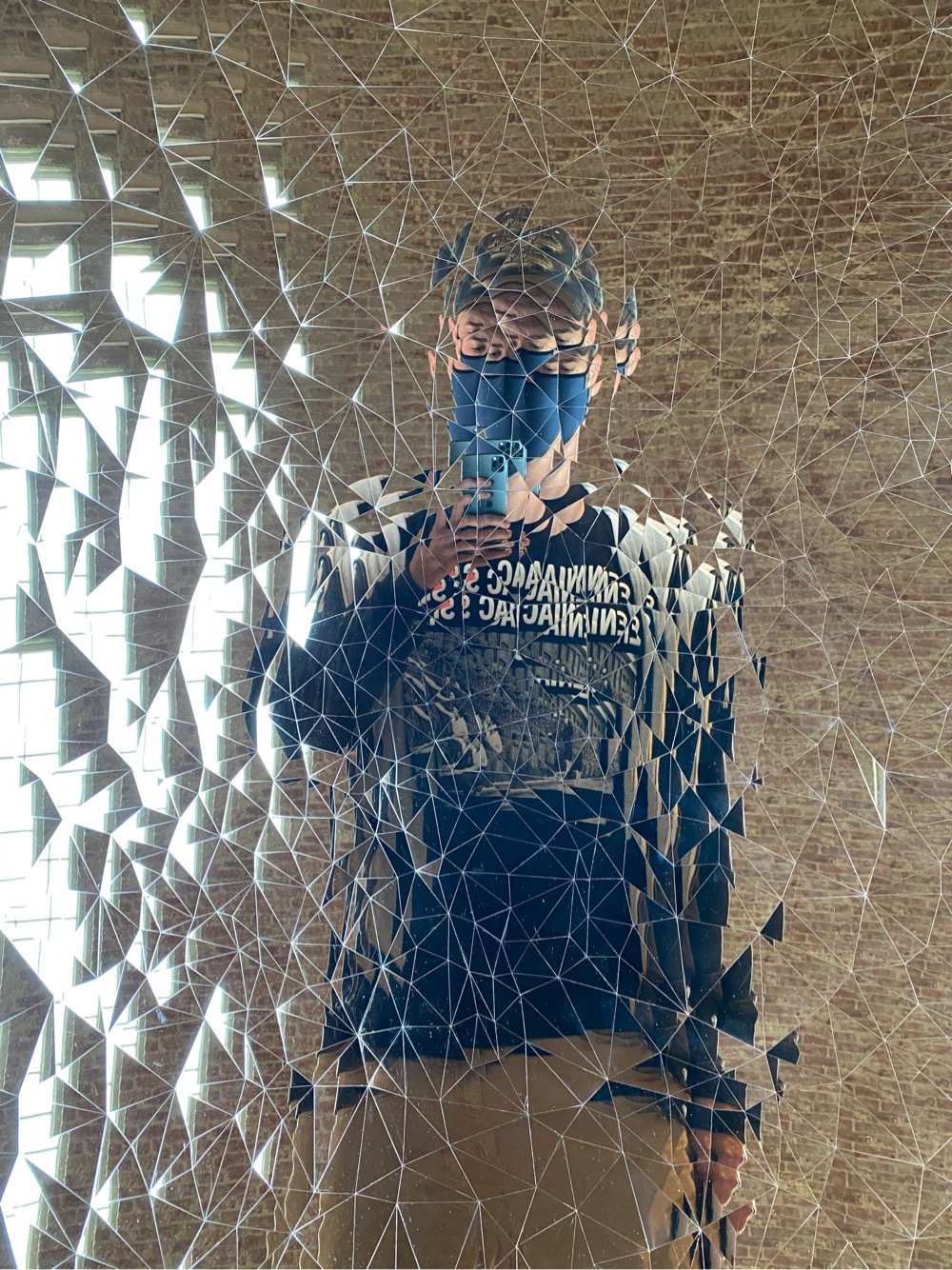 Jason Kottke reflected in a fractured mirror