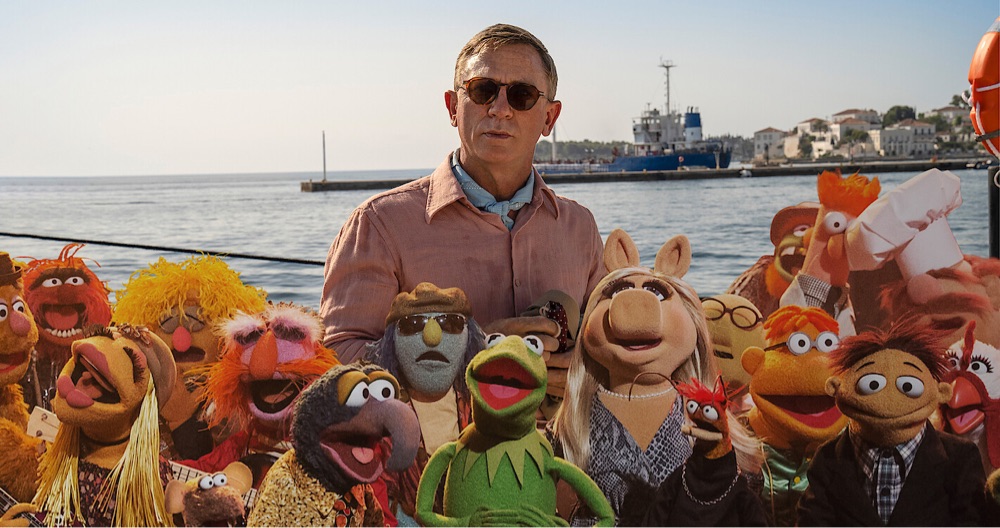 a group of Muppets standing with Benoit Blanc